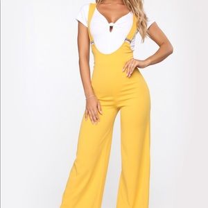 Flared yellow suspender pants